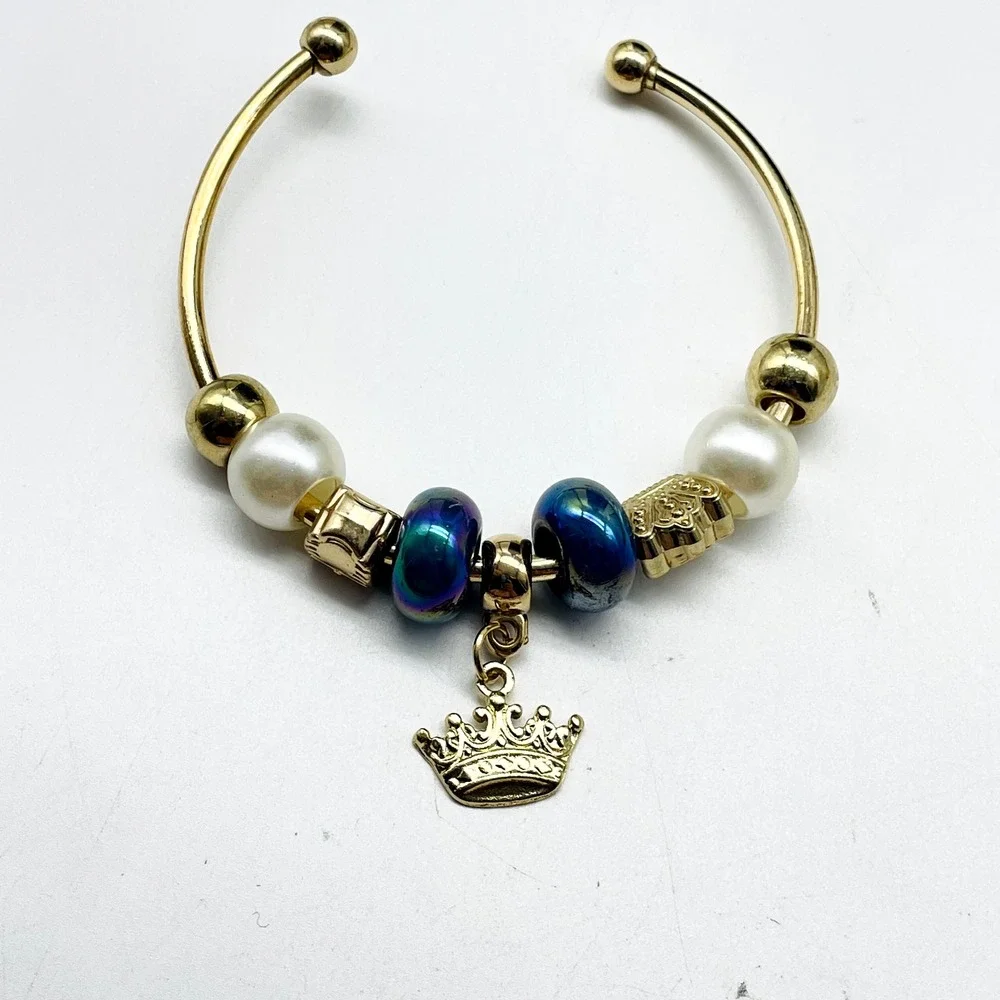 D'Bello Gold Tone Cuff Bracelet Blue Crystal Beads Crown Charm Adjustable NWT
